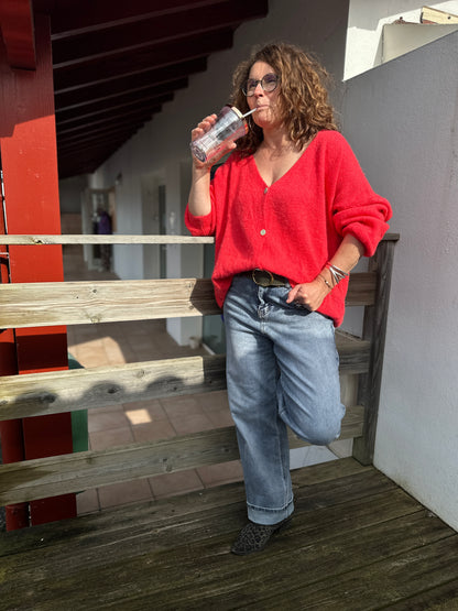 Gilet col V corail au style cosy et féminin, parfait pour une touche colorée - Abana Boutique 64250