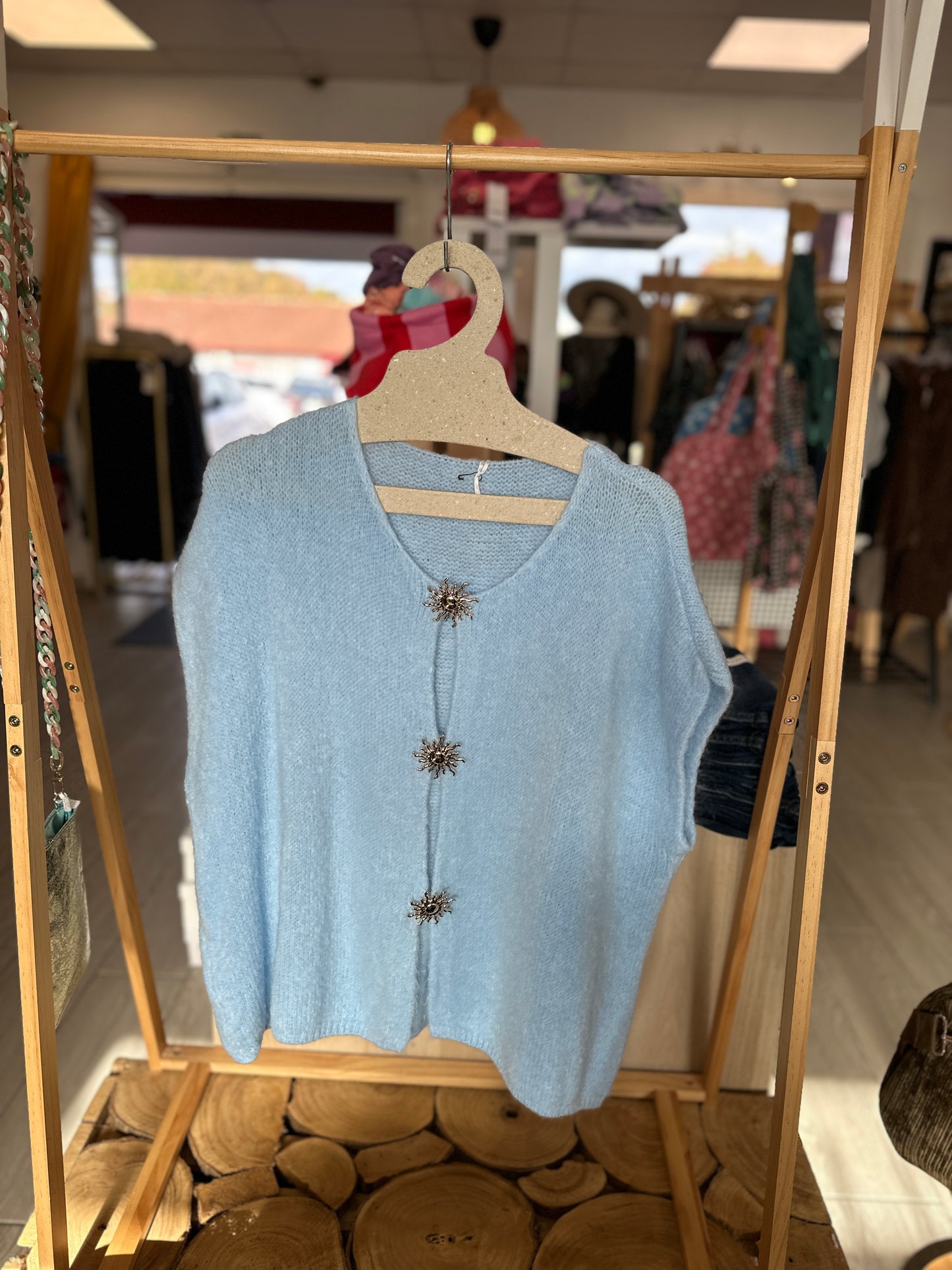 Gilet turquoise doux et chaud avec broches soleil amovibles - Abana 64480