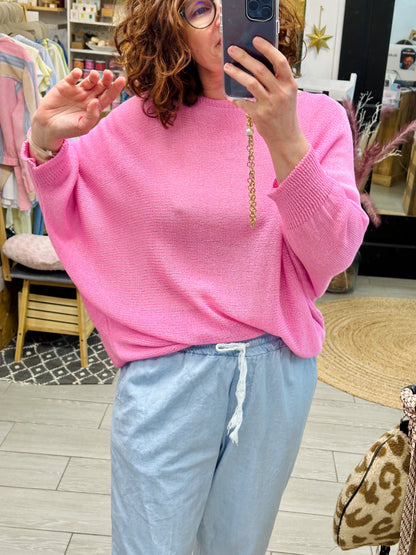 pull rose pastel en taille unique pour femme du 44 au 50 avec nœud satiné au dos, à retrouver à Abana au Pays Basque