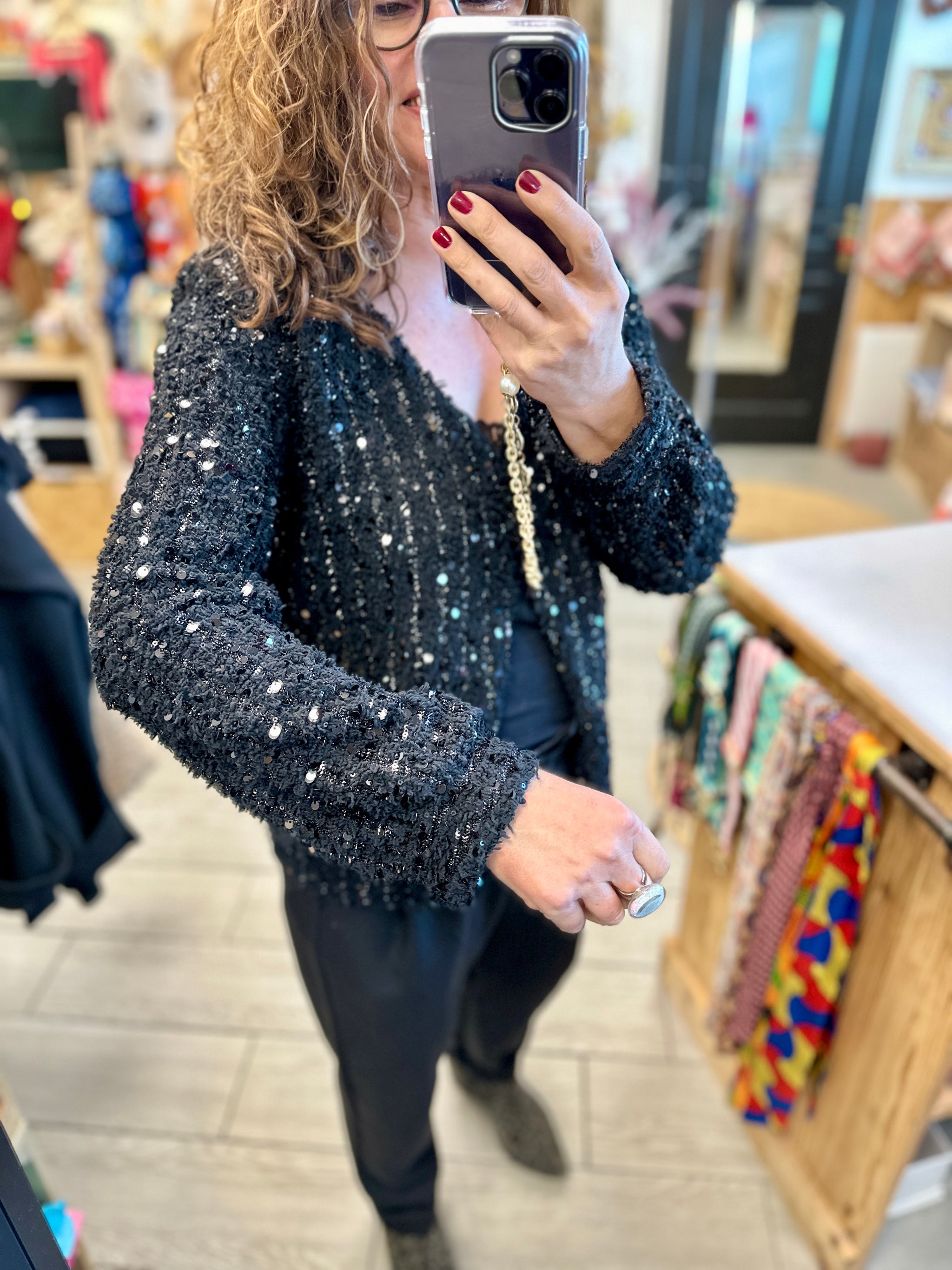 Pull à sequins noirs dos croisé effet dos nu femme – Boutique Abana 64310
