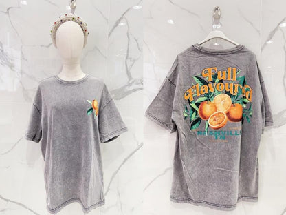 T-shirt oversize gris avec une broderie d’oranges et inscription "Full of Vitamins" – Style vitaminé et original