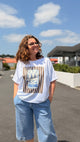 look avec bermudas en jean bleu et teeshirt blanc manches courtes a rayure marron sardine in april 1986 rennes brest lorient